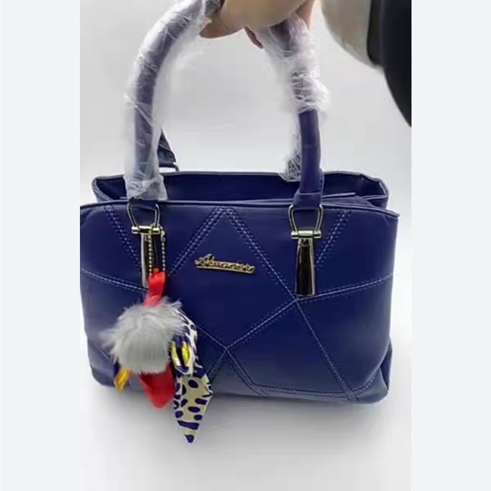Blue Handbag with Decorative Charms